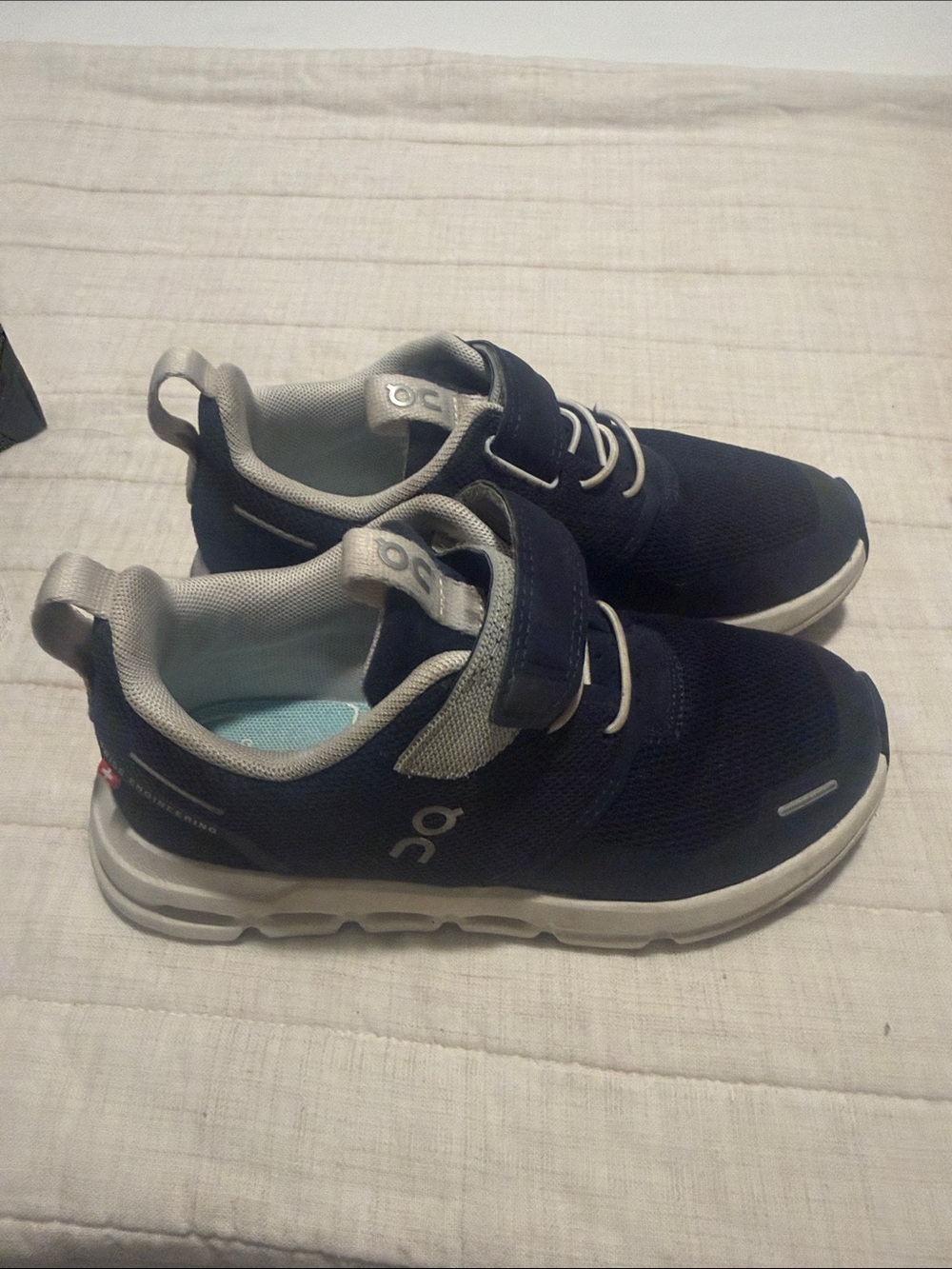 On Running Kids Navy and White Sneakers with Gray Accents